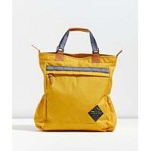 Yellow convertible backpack made by United By Blue.